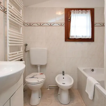 Holiday home Lovely In